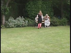 En hel del fotografer med utskjutande medlemmar och modell
